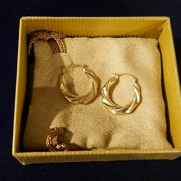 JTV 10k Yellow Gold Twisted Tube Hoop Earrings